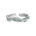 Aqua Wave Ring – adjustable open ring in rhodium-plated 925 sterling silver with aqua green epoxy inlay