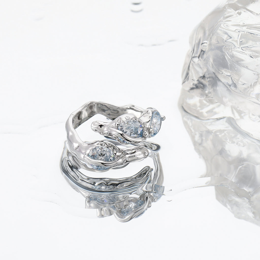 Blue Wave Ring – adjustable sculptural wave ring with blue cubic zirconia in 925 sterling silver, view 4