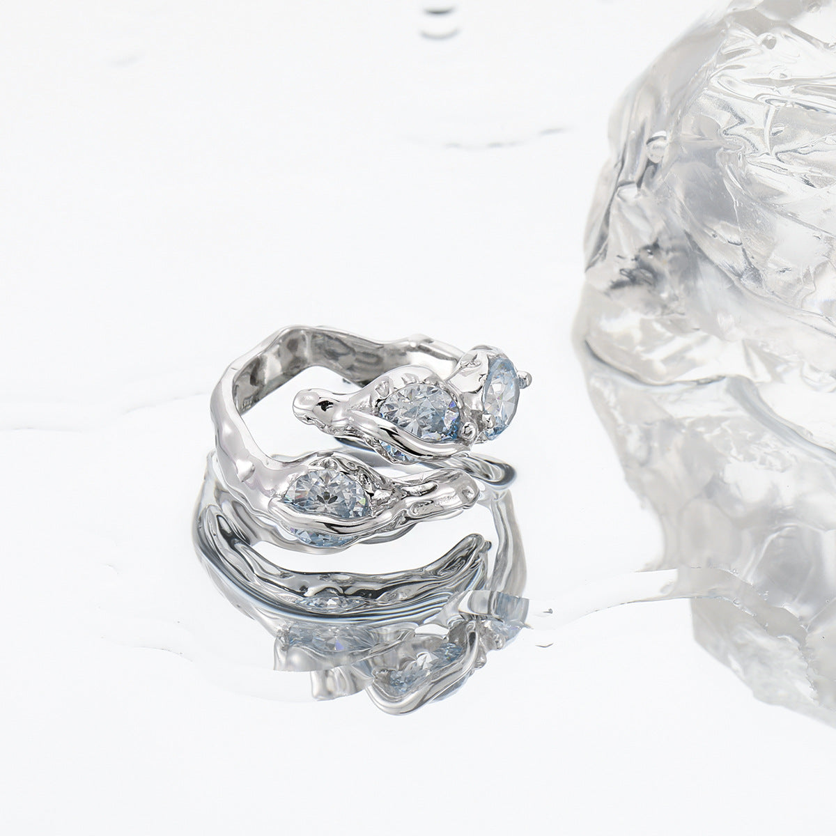 Blue Wave Ring – adjustable sculptural wave ring with blue cubic zirconia in 925 sterling silver, view 4