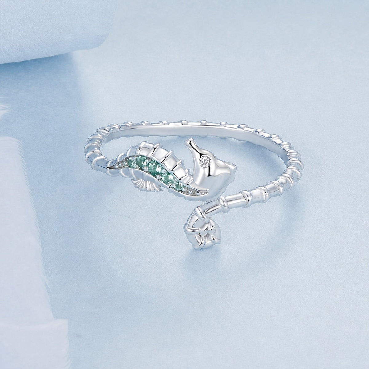 Seahorse Ring – close-up of the blue-green and clear zirconia detail, 925 sterling silver